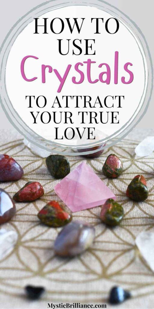 Picture of an arrangement of various crystals with a central pink crystal sitting on a patterned surface with text overlay How to Use Crystals to Attract Your True Love